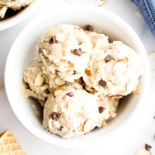Paleo Vegan Almond Joy Ice Cream (V, GF): a 7 ingredient recipe for deliciously creamy, no churn ice cream bursting with coconut, chocolate and almonds. #Vegan #Paleo #DairyFree #GlutenFree | BeamingBaker.com
