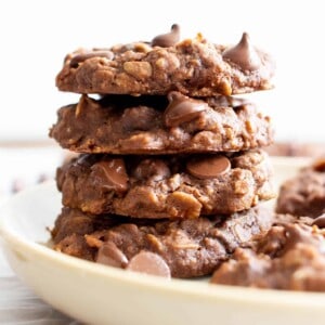 Vegan Double Chocolate Chip Chewy Oatmeal Cookies Recipe (V, GF): an easy recipe for chewy, dense chocolate chocolate oatmeal cookies made with cocoa powder and bursting with chocolate flavor and wholesome oats. Made with healthy, whole ingredients. #OatmealCookies #Vegan #GlutenFree #VeganGlutenFree #VeganBaking #BeamingBaker | Recipe at BeamingBaker.com