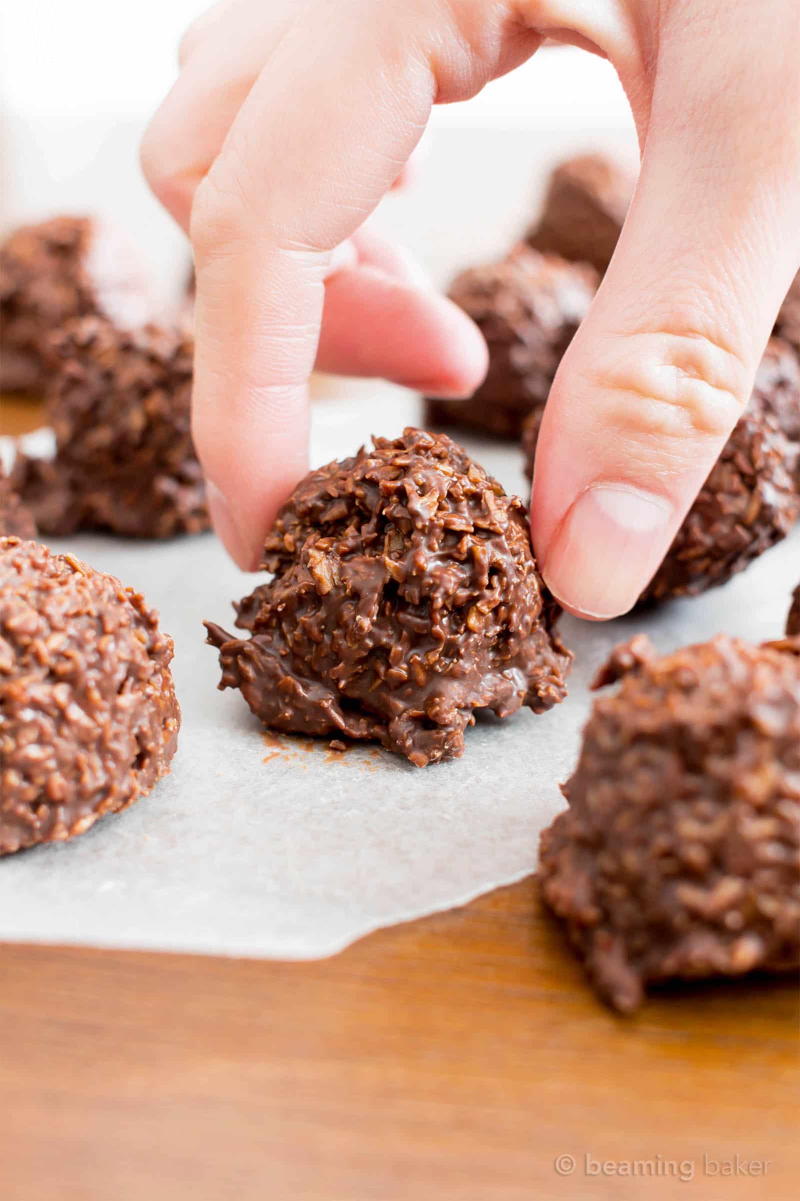 2 Ingredient Chocolate Coconut Candy Clusters: just 5 mins of prep for 2 ingredient coconut chocolate clusters packed with chewy coconut flakes. The easiest chocolate coconut candy clusters! #Coconut #Chocolate #Candy #Clusters | Recipe at BeamingBaker.com