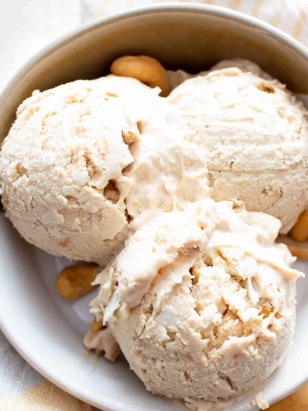 Cashew Ice Cream Recipe: just 3 ingredients for deliciously creamy cashew ice cream. The best cashew ice cream recipe—no churn, super easy and satisfying! Vegan, Paleo. #Cashew #IceCream #CashewIceCream #CashewButter | Recipe at BeamingBaker.com