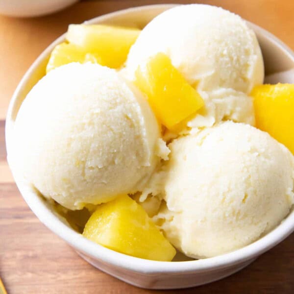 Pineapple Coconut Sorbet: just 2 ingredients and 5 minutes to make delicious coconut pineapple sorbet. Healthy, Dairy-Free, Paleo, Vegan. #Coconut #Pineapple #Sorbet #Vegan | Recipe at BeamingBaker.com