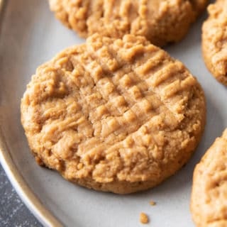 The best healthy peanut butter cookies, made with just 4 ingredients. You’ll love these refined sugar free gluten free peanut butter cookies. #healthy #glutenfree #peanutbutter #cookies | Recipe at BeamingBaker.com