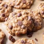 Easy Healthy Oatmeal Chocolate Chip Cookies: this easy healthy oatmeal chocolate chip cookies recipe yields chewy cookies with crispy edges and lots of chocolate chips! Vegan, Gluten-Free, Dairy-Free, Healthy. #Healthy #OatmealCookies #HealthyCookies #ChocolateChip | Recipe at BeamingBaker.com