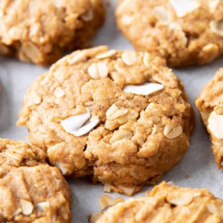 Peanut Butter Coconut Oatmeal Cookies (Vegan, Gluten Free): an easy recipe for deliciously thick, chewy peanut butter cookies bursting with coconut and oats. Refined Sugar-Free, Clean Ingredients, Dairy-Free. #PeanutButter #Cookies #Coconut #Oatmeal | Recipe at BeamingBaker.com