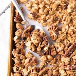 Gluten Free Granola: this 4 ingredient vegan granola recipe is prep’d in 5 minutes! The best GF granola: crunchy clusters, healthy ingredients & great flavor! #GlutenFree #Granola #Vegan #GF | Recipe at BeamingBaker.com