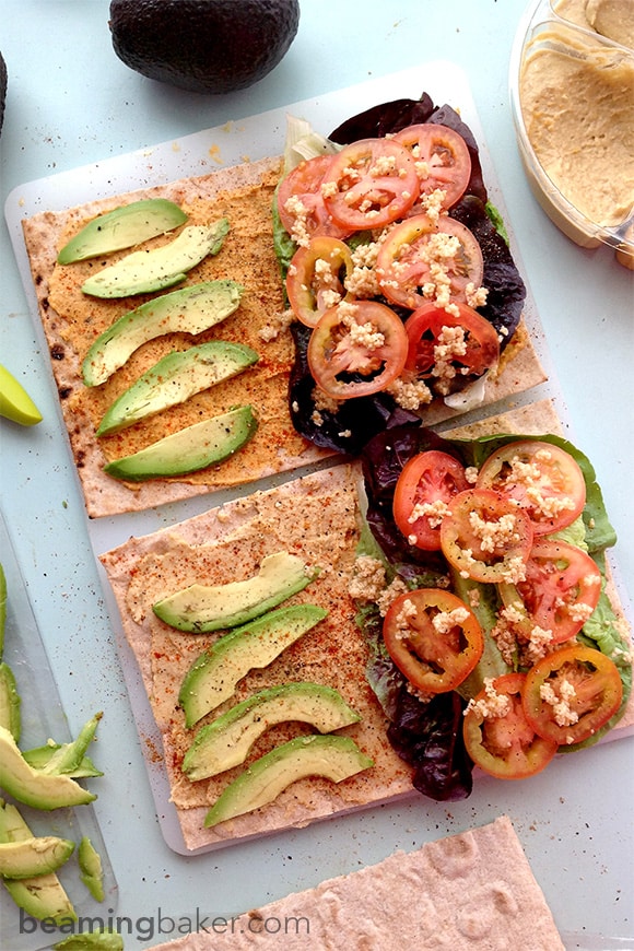 Avocado Hummus Wraps: super fresh avocado and hummus on a bed of crispy lettuce come together for a quick picnic-ready wrap!