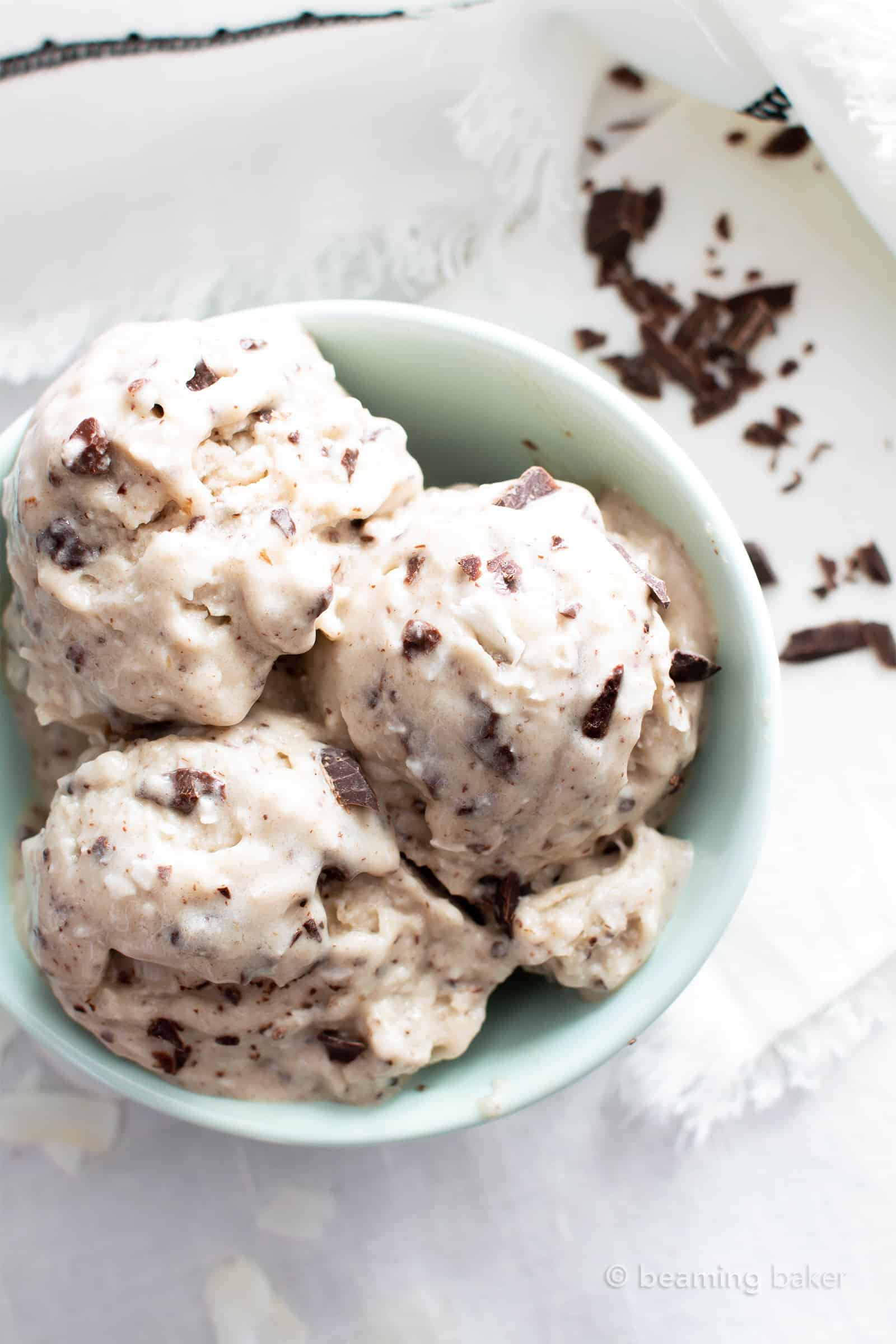 Coconut Chocolate Chip Vegan Ice Cream Recipe: this delicious vegan ice cream recipe is wonderfully rich ‘n creamy! The best homemade vegan ice cream—packed with coconut & chocolate chips, no churn. #Vegan #IceCream #Coconut #ChocolateChip #VeganIceCream | Recipe at BeamingBaker.com