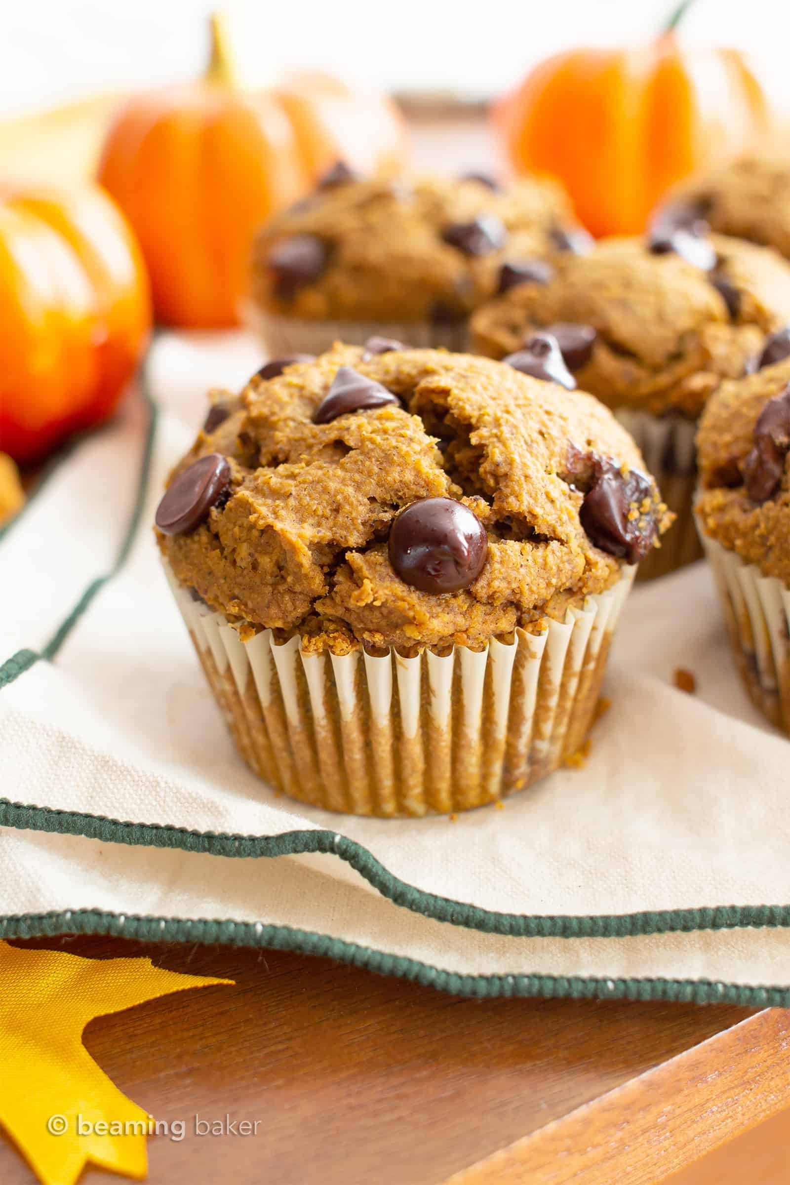 Gluten Free Pumpkin Chocolate Chip Muffins Recipe (GF): this easy gluten free pumpkin muffins recipe makes perfectly spiced GF pumpkin muffins! Made in 1-bowl with healthy, whole ingredients. #Pumpkin #Muffins #Chocolate #GlutenFree #Vegan | Recipe at BeamingBaker.com