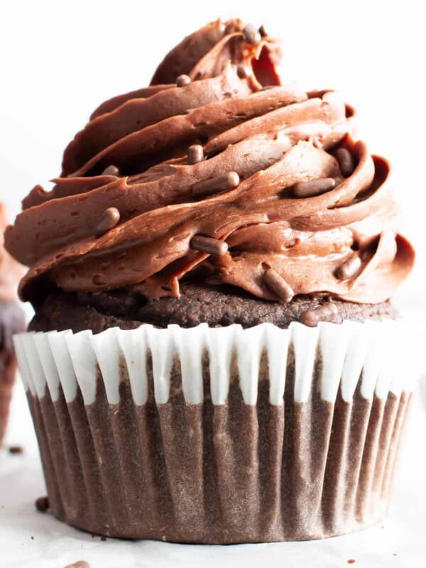 Vegan Gluten Free Chocolate Cupcakes (GF): fluffy ‘n moist healthy chocolate cupcakes with a soft crumb, topped with creamy, smooth chocolate frosting! The best GF oat flour cupcakes—Refined Sugar-Free, Dairy-Free! #GlutenFree #Cupcakes #Vegan #Chocolate #DairyFree | Recipe at BeamingBaker.com