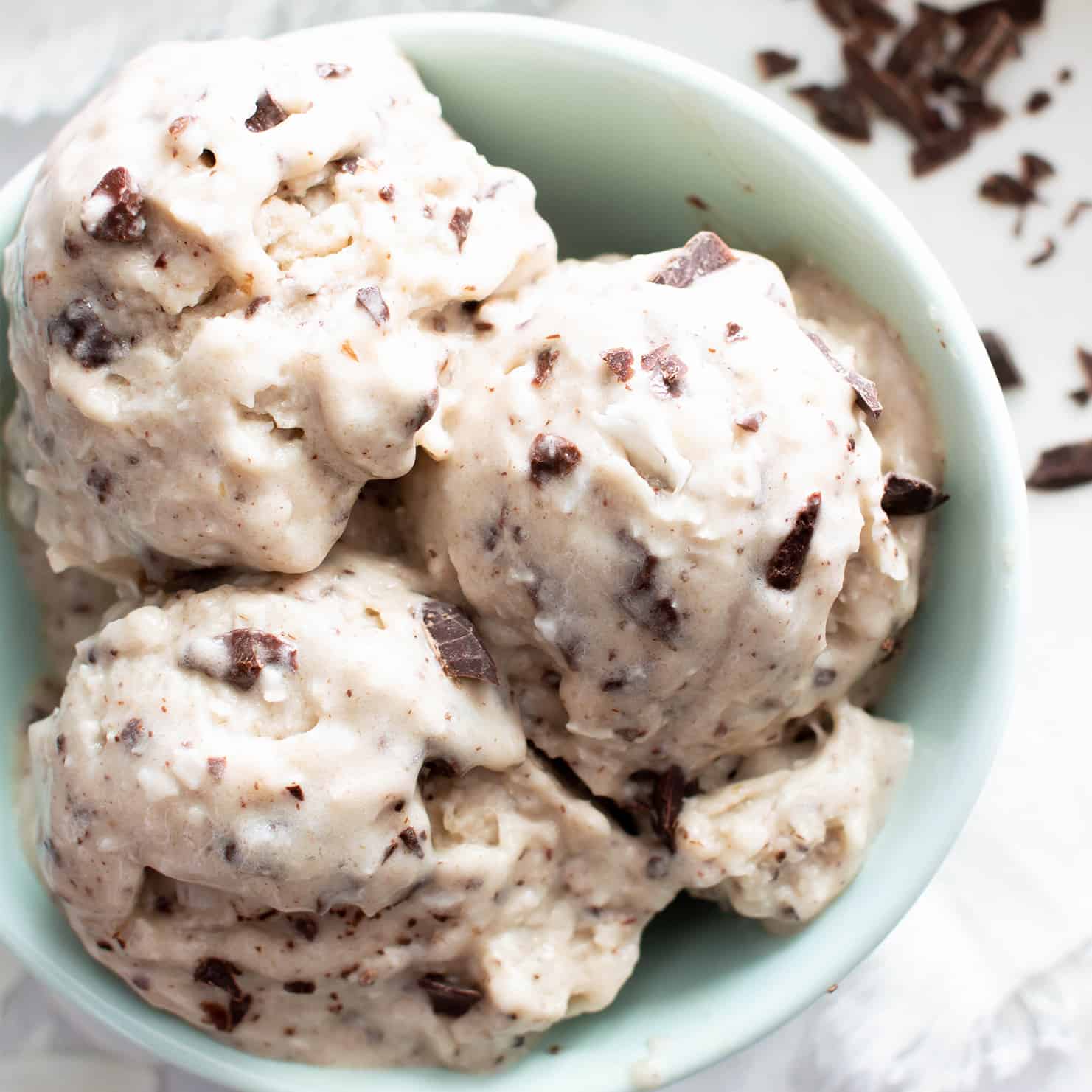 Coconut Chocolate Chip Healthy Vegan Ice Cream Recipe: Learn how to make homemade vegan ice cream w/ coconut & chocolate! This dairy-free paleo ice cream recipe is no-churn, easy, non dairy, made with 6 ingredients. #Paleo #Vegan #DairyFree #Healthy #IceCream | Recipe at BeamingBaker.com