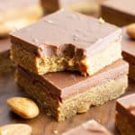 No Bake Paleo Chocolate Almond Butter Bars: this easy paleo dessert recipe yields deliciously thick no bake almond butter bars topped with velvety paleo chocolate. It’s the best quick & simple paleo sweets recipe! #Paleo #NoBake #Dessert #Vegan #Treats | Recipe at BeamingBaker.com