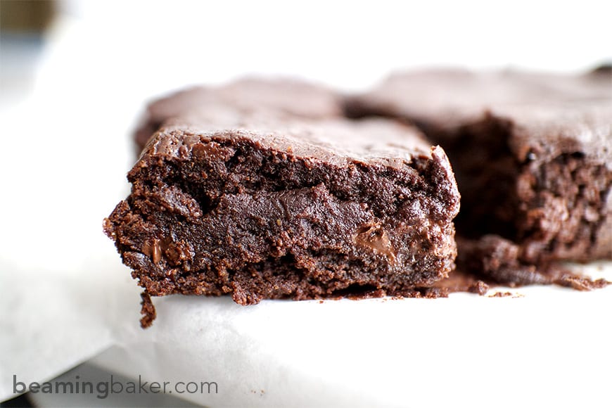 Side view of the best vegan brownies, showing the fudgy center