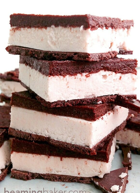 Vegan Ice Cream Sandwiches: A vegan chocolate shell twist on the frozen classic. Two thick layers of homemade chocolate shell sandwich "ice cream" made out of raw cashews. Mouthwateringly good for dessert or breakfast.