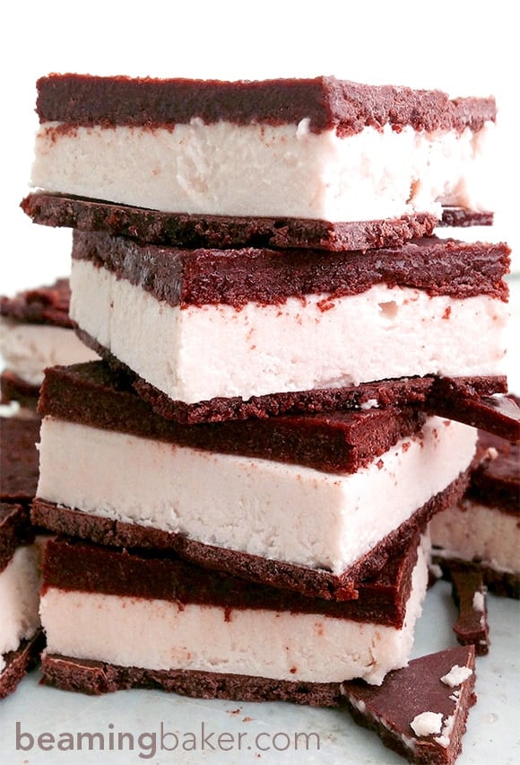 Vegan ice cream sandwiches: A chocolate shell twist on a classic frozen dessert. A thick layer of raw cashew ice cream sandwiched between two layers of homemade chocolate shell. #Vegan #GlutenFree #DairyFree | BeamingBaker.com