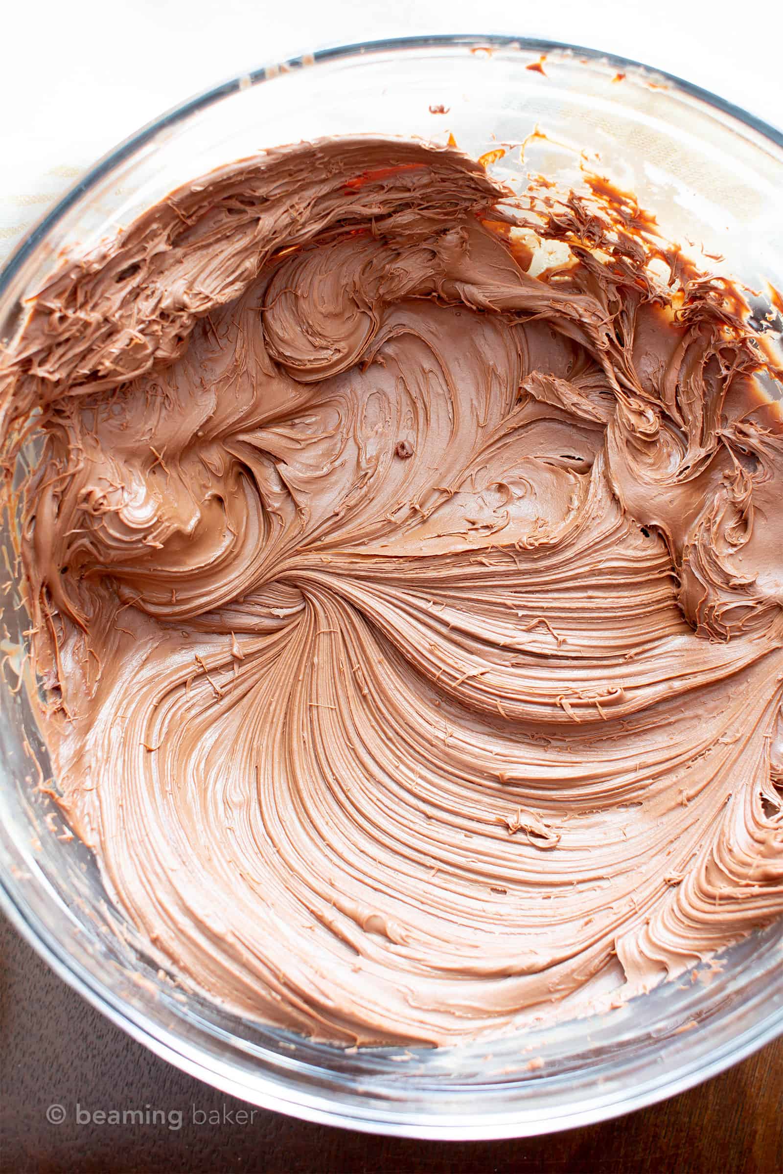 Vegan Chocolate Frosting: smooth ‘n creamy vegan chocolate frosting that’s so easy to pipe. Just 2 ingredients for the best dairy free frosting! #Vegan #ChocolateFrosting #VeganFrosting #DairyFree | Recipe at BeamingBaker.com