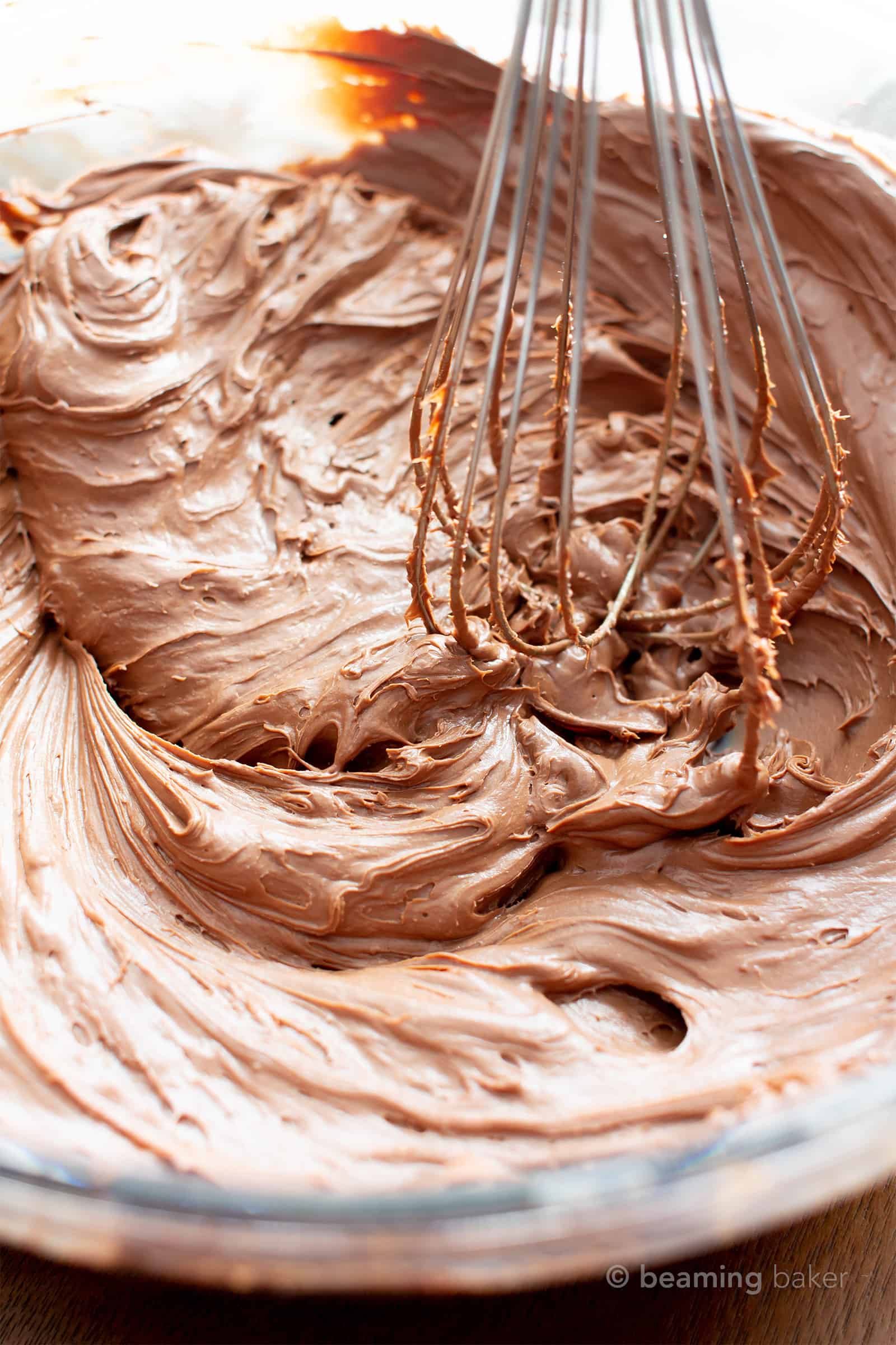 Vegan Chocolate Frosting: smooth ‘n creamy vegan chocolate frosting that’s so easy to pipe. Just 2 ingredients for the best dairy free frosting! #Vegan #ChocolateFrosting #VeganFrosting #DairyFree | Recipe at BeamingBaker.com