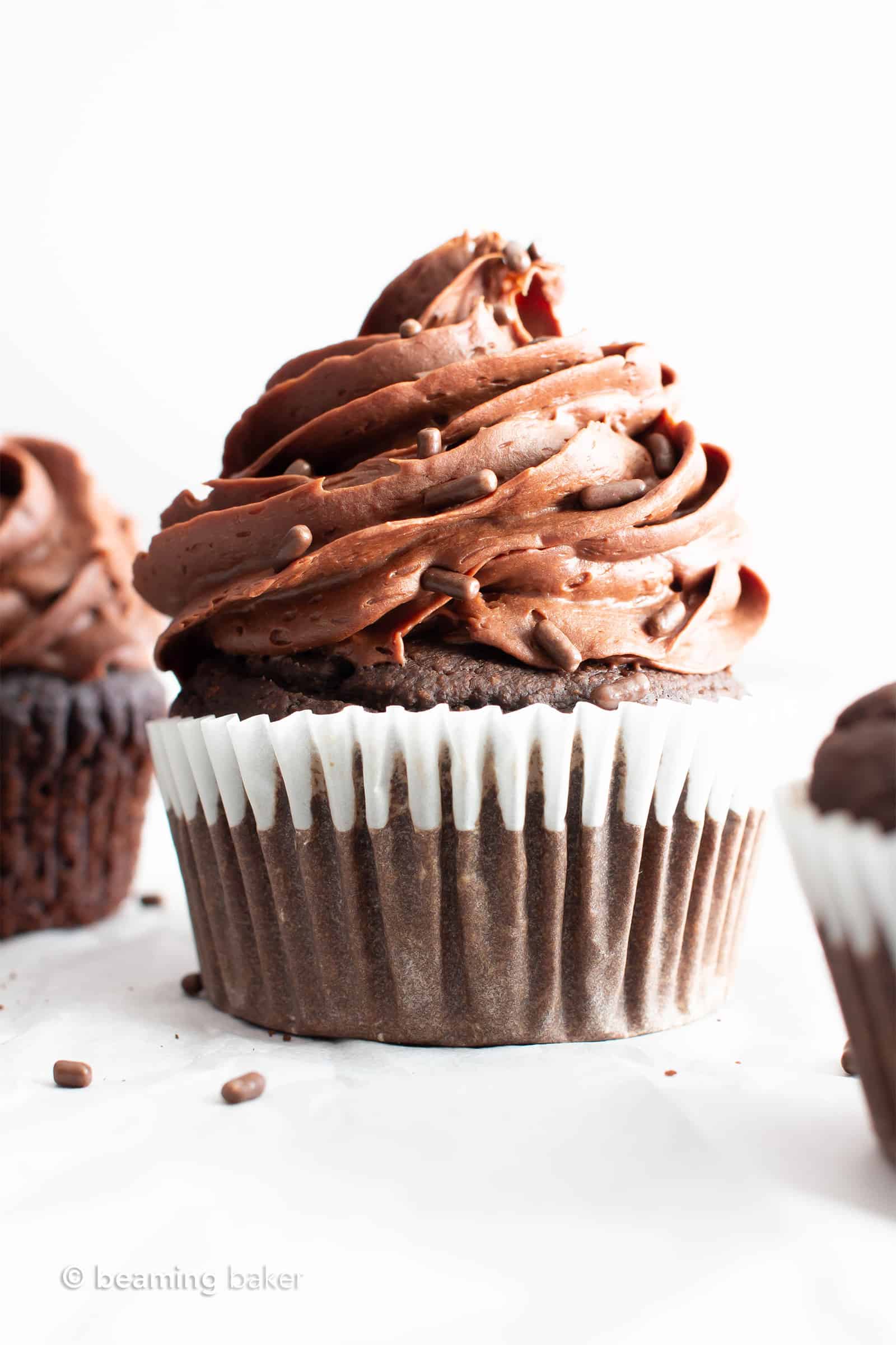 Vegan Gluten Free Chocolate Cupcakes (GF): fluffy ‘n moist healthy chocolate cupcakes with a soft crumb, topped with creamy, smooth chocolate frosting! The best GF oat flour cupcakes—Refined Sugar-Free, Dairy-Free! #GlutenFree #Cupcakes #Vegan #Chocolate #DairyFree | Recipe at BeamingBaker.com