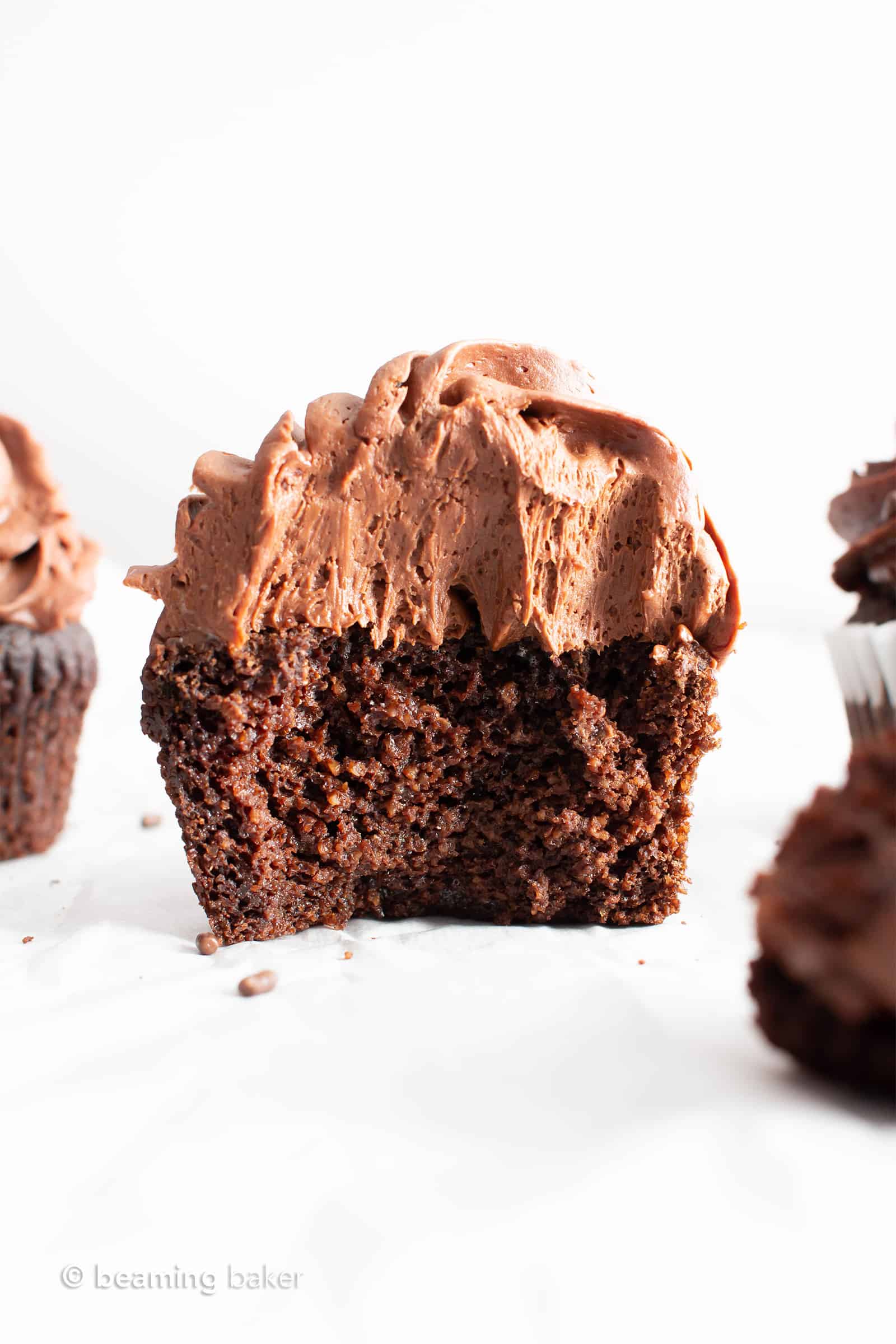 Vegan Gluten Free Chocolate Cupcakes (GF): fluffy ‘n moist healthy chocolate cupcakes with a soft crumb, topped with creamy, smooth chocolate frosting! The best GF oat flour cupcakes—Refined Sugar-Free, Dairy-Free! #GlutenFree #Cupcakes #Vegan #Chocolate #DairyFree | Recipe at BeamingBaker.com