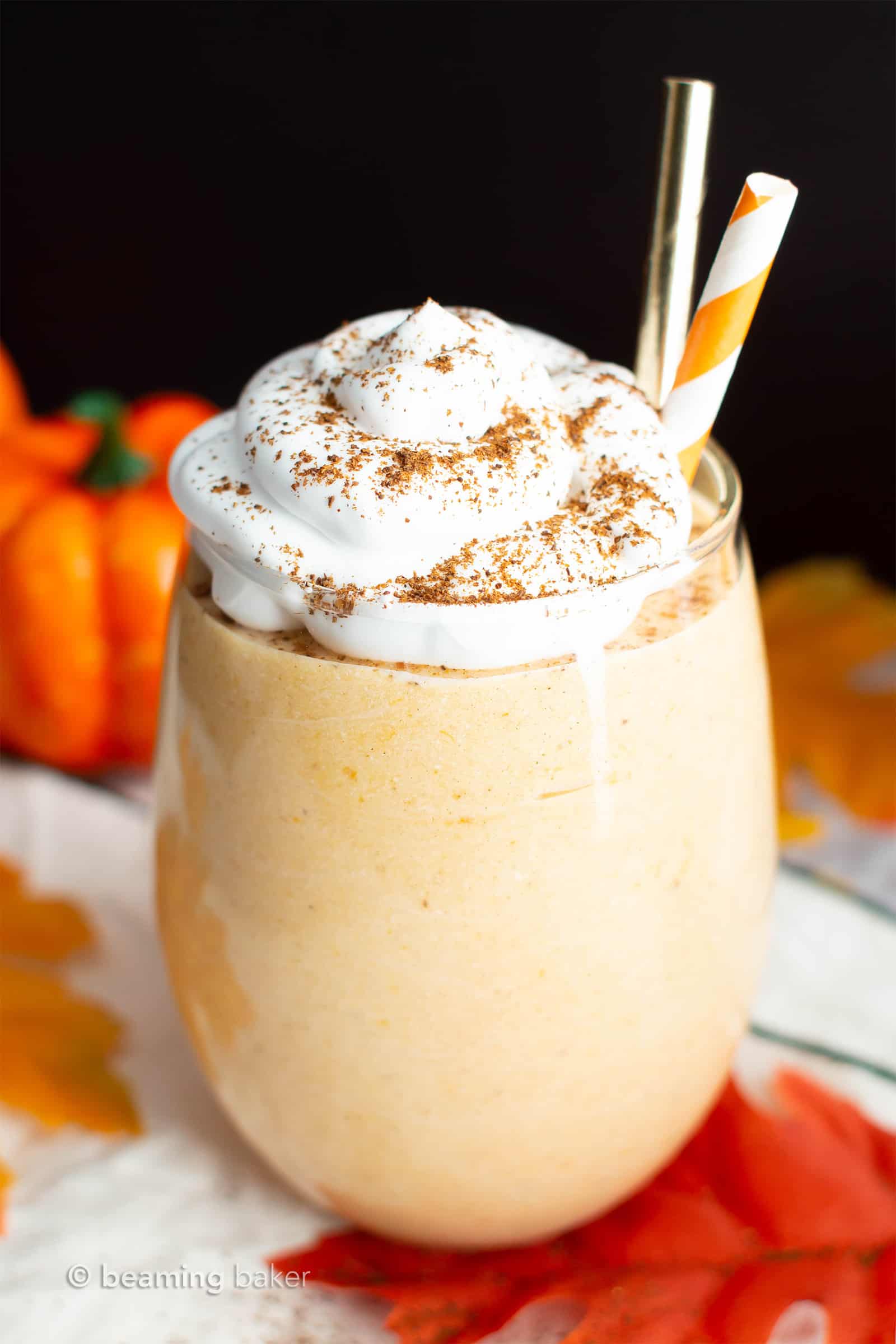 Vegan Pumpkin Pie Smoothie Recipe: this 6 ingredient PALEO pumpkin smoothie is creamy, perfectly spiced! Dairy-free pumpkin coconut milk smoothie YUM! #Paleo #Vegan #Pumpkin #Smoothie #DairyFree | Recipe at BeamingBaker.com