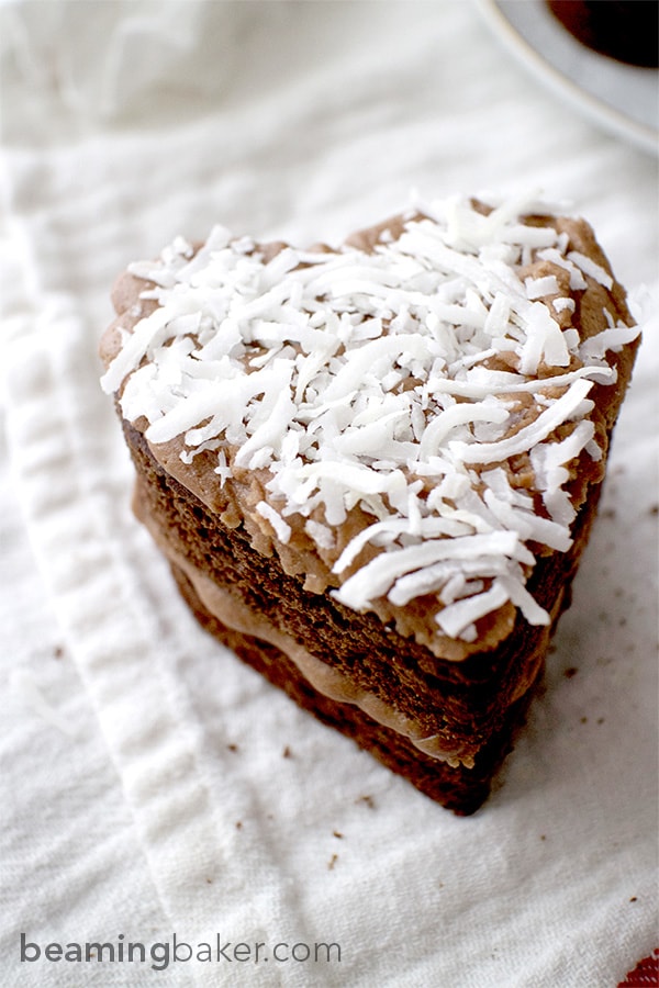 Adorable mini, heart-shaped, two-layer chocolate cakes topped with slightly sweet coconut oil frosting. An impressive and delightful treat to make for any occasion.