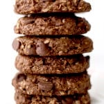 Rich, chewy & indulgent Double Chocolate Chip Cookies - a simple, vegan recipe for twice the chocolate plus coconut oil, coconut sugar and coconut shreds! BEAMINGBAKER.COM #vegan #oatflour