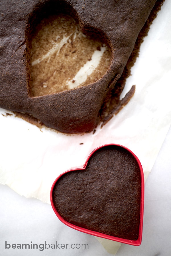 Adorable mini, heart-shaped, two-layer chocolate cakes topped with slightly sweet coconut oil frosting. An impressive and delightful treat to make for any occasion.