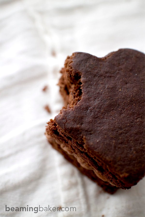 Adorable mini, heart-shaped, two-layer chocolate cakes topped with slightly sweet coconut oil frosting. An impressive and delightful treat to make for any occasion.