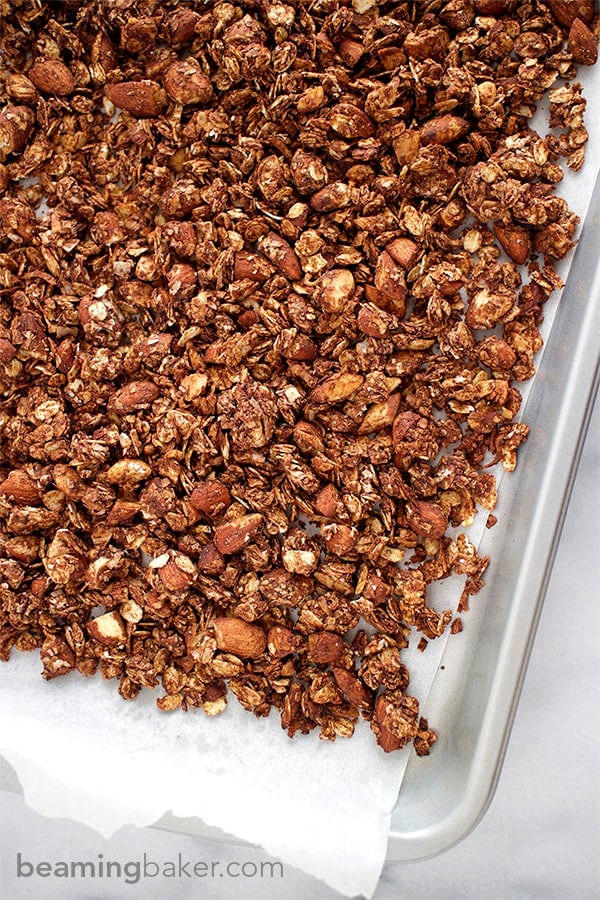 Simple, crunchy, sweet-tooth satisfying Chocolate Almond Coconut Granola. This wholesome recipe is perfect for an afternoon snack or dessert.