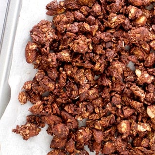 Simple, crunchy, sweet-tooth satisfying Chocolate Almond Coconut Granola. This wholesome recipe is perfect for an afternoon snack or dessert.