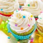 Funfetti Birthday Cupcakes: Moist, classic white cupcakes speckled with funfetti sprinkles and topped with luscious, fluffy vanilla frosting. BEAMINGBAKER.COM #birthday #cupcakes