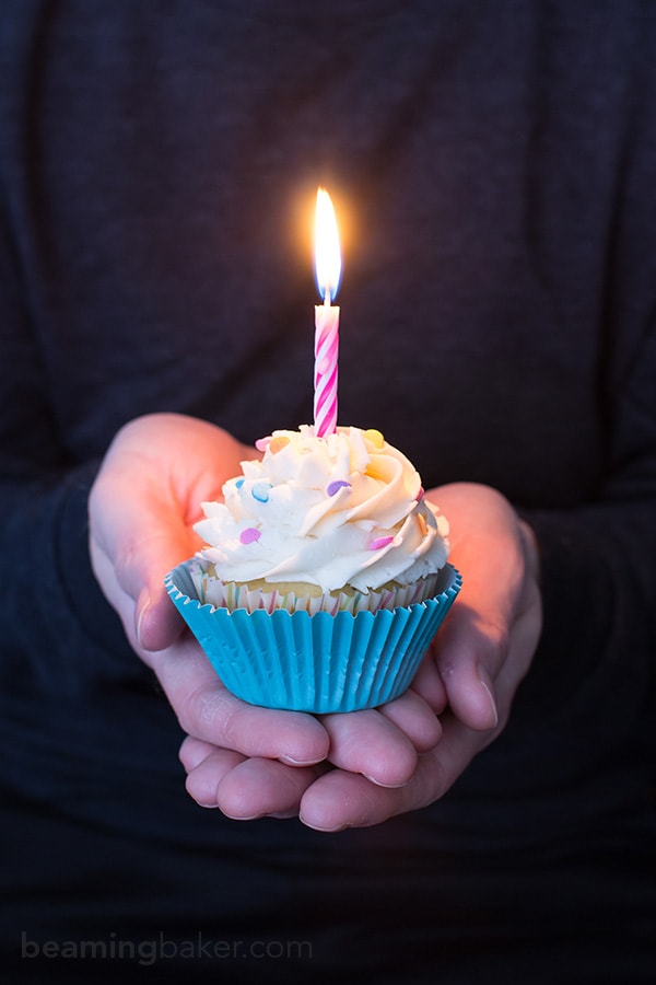 Funfetti Birthday Cupcakes: Moist, classic white cupcakes speckled with funfetti sprinkles and topped with luscious, fluffy vanilla frosting. BEAMINGBAKER.COM #birthday #cupcakes #funfetti