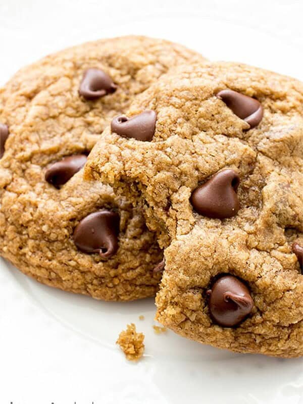 Soft, chewy, gooey Healthier Vegan Chocolate Chip Cookies. Made with oat flour, whole wheat flour, coconut sugar and coconut oil. BEAMINGBAKER.COM