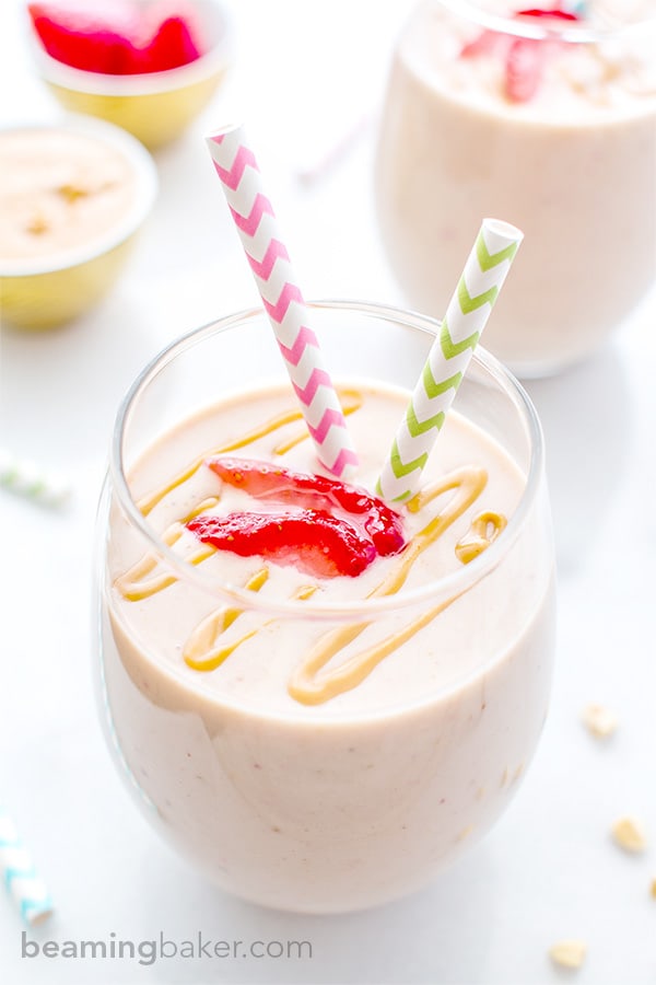 Protein-Packed Strawberry Peanut Butter Smoothie: Just 5 simple ingredients in a quick and easy recipe for a creamy, healthy and protein-rich smoothie chockfull of strawberries and peanut butter. BEAMINGBAKER.COM #healthy #5ingredients