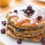 Vegan Blueberry Pancakes: An easy recipe for fluffy, moist blueberry pancakes that are perfect for a cozy breakfast or brunch. BEAMINGBAKER.COM #Vegan #OneBowl