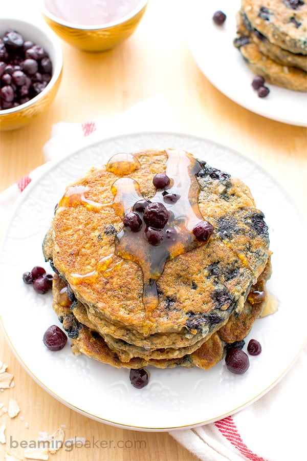 Vegan Blueberry Pancakes: An easy recipe for fluffy, moist blueberry pancakes that are perfect for a cozy breakfast or brunch. BEAMINGBAKER.COM #Vegan #OneBowl