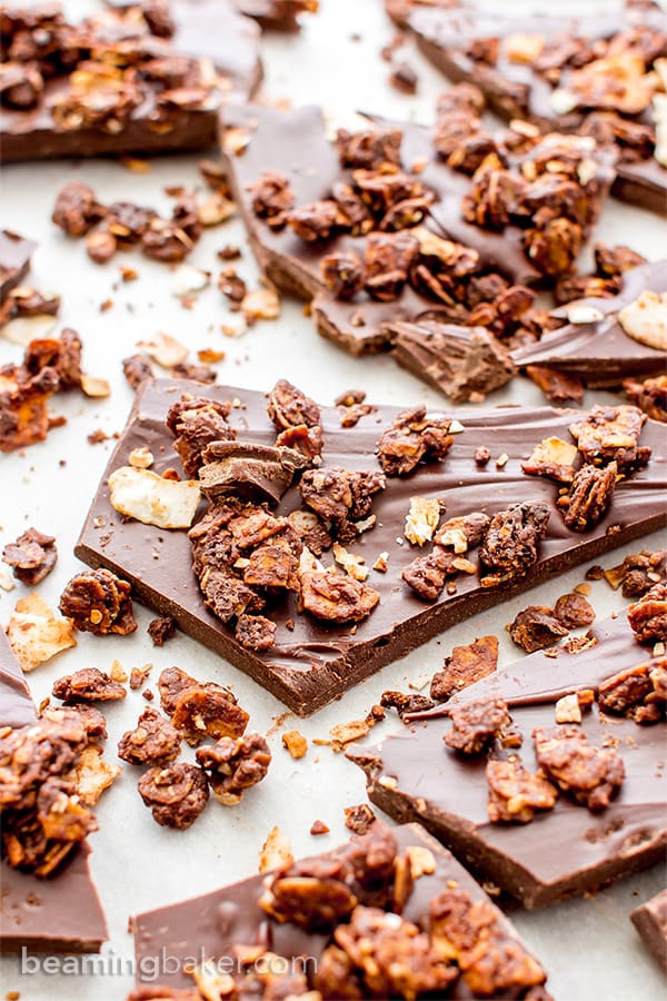 Chocolate Coconut Granola Bark (V+GF): Richly indulgent, heavenly chocolate covered coconut granola enrobed in a thick layer of chocolate. BeamingBaker.com #Vegan #GlutenFree