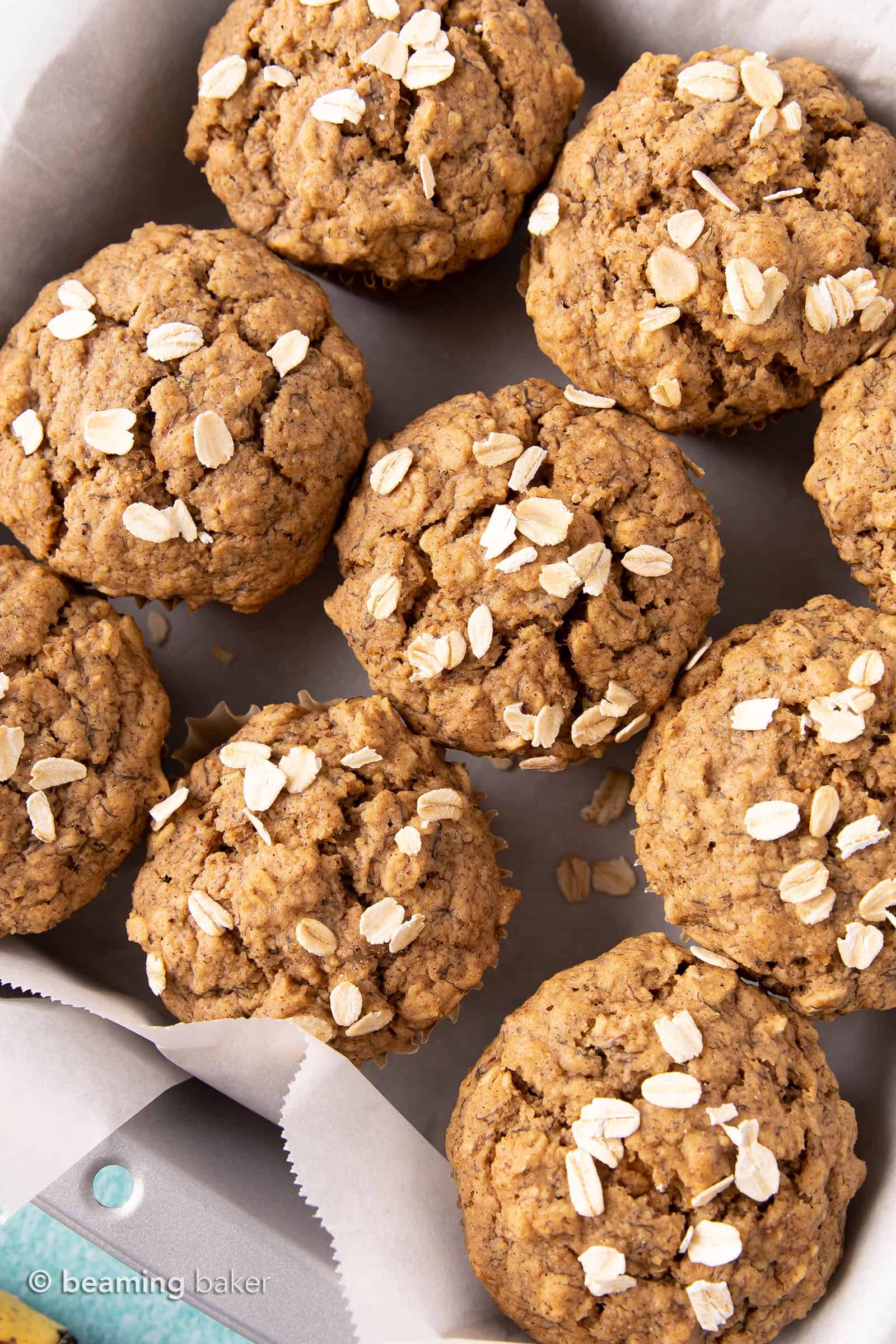 Gluten Free Banana Oat Muffins (V+GF): a one bowl recipe for warm, moist and lightly sweet Banana Oat Muffins made with simple ingredients. #vegan #glutenfree #breakfast #healthy | Recipe on BeamingBaker.com