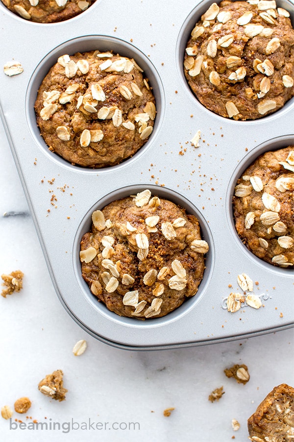 Gluten Free Banana Oat Muffins (V+GF): a one bowl recipe for warm, moist and lightly sweet Banana Oat Muffins made with simple ingredients. #vegan #glutenfree #breakfast #healthy | Recipe on BeamingBaker.com