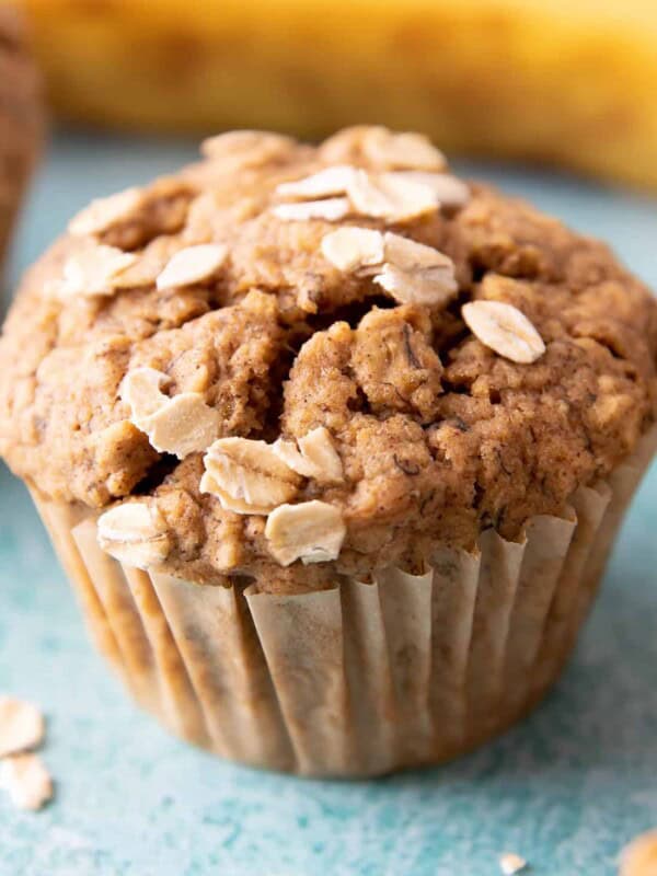 Gluten Free Banana Oat Muffins (V+GF): a one bowl recipe for warm, moist and lightly sweet Banana Oat Muffins made with simple ingredients. #vegan #glutenfree #breakfast #healthy | Recipe on BeamingBaker.com