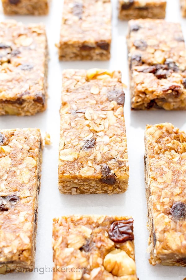 No Bake Oatmeal Raisin Granola Bars (V+GF): Soft and chewy granola bars that taste just like an oatmeal raisin cookie. An easy Vegan and Gluten Free recipe made with whole ingredients. BEAMINGBAKER.COM #Vegan #GlutenFree