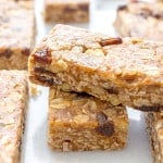 No Bake Oatmeal Raisin Granola Bars (V+GF): Soft and chewy granola bars that taste just like an oatmeal raisin cookie. An easy Vegan and Gluten Free recipe made with whole ingredients. BEAMINGBAKER.COM #Vegan #GlutenFree