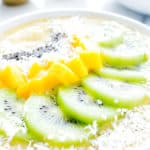 Mango Kiwi Chia Seed Smoothie Bowl (V+GF): a super easy recipe for a light, refreshing and filling smoothie bowl full of mangoes and topped with kiwis. #Vegan #GlutenFree | BeamingBaker.com