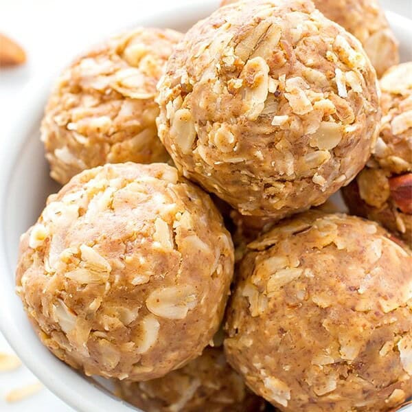 No Bake Almond Butter Coconut Bites (V+GF): Nutty, lightly sweet and satisfying energy bites made from just 6 simple ingredients. BeamingBaker.com #Vegan #Gluten Free