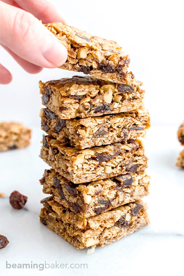 Oatmeal Raisin Cookie Bars (V+GF): an easy recipe for soft, chewy cookie bars made from simple ingredients, bursting with juicy raisins and walnuts. #Vegan #GlutenFree | BeamingBaker.com