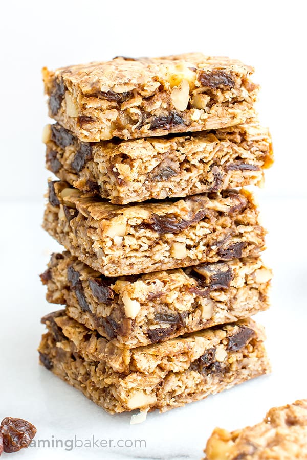 Oatmeal Raisin Cookie Bars (V+GF): an easy recipe for soft, chewy cookie bars made from simple ingredients, bursting with juicy raisins and walnuts. #Vegan #GlutenFree | BeamingBaker.com