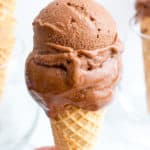 Dark Chocolate Nice Cream (V+GF): an easy, 4 ingredient recipe for velvety smooth, rich dark chocolate nice cream made of bananas, cocoa powder and maple syrup. #Vegan #GlutenFree #DairyFree | BeamingBaker.com