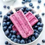 Vegan Blueberry Coconut Popsicles (V+GF): a 3 ingredient recipe for creamy popsicles packed with blueberries and coconut flavor. #Vegan #GlutenFree #DairyFree | BeamingBaker.com