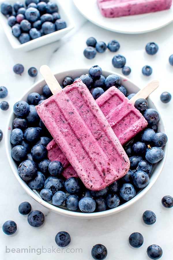 Vegan Blueberry Coconut Popsicles (V+GF): a 3 ingredient recipe for creamy popsicles packed with blueberries and coconut flavor. #Vegan #GlutenFree #DairyFree | BeamingBaker.com