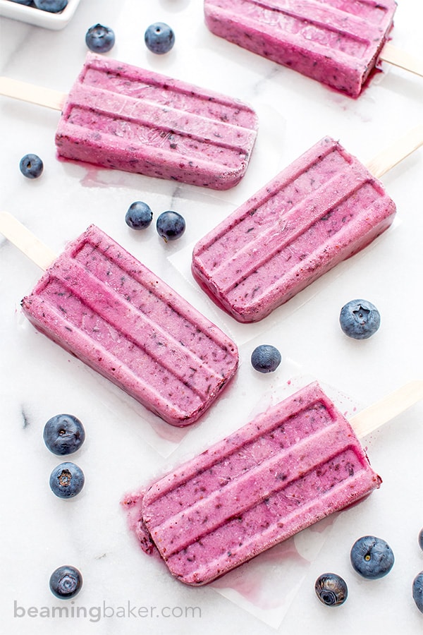 Vegan Blueberry Coconut Popsicles (V+GF): a 3 ingredient recipe for creamy popsicles packed with blueberries and coconut flavor. #Vegan #GlutenFree #DairyFree | BeamingBaker.com