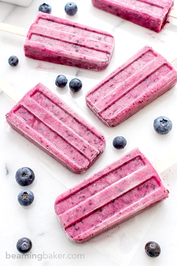 Vegan Blueberry Coconut Popsicles (V+GF): a 3 ingredient recipe for creamy popsicles packed with blueberries and coconut flavor. #Vegan #GlutenFree #DairyFree | BeamingBaker.com